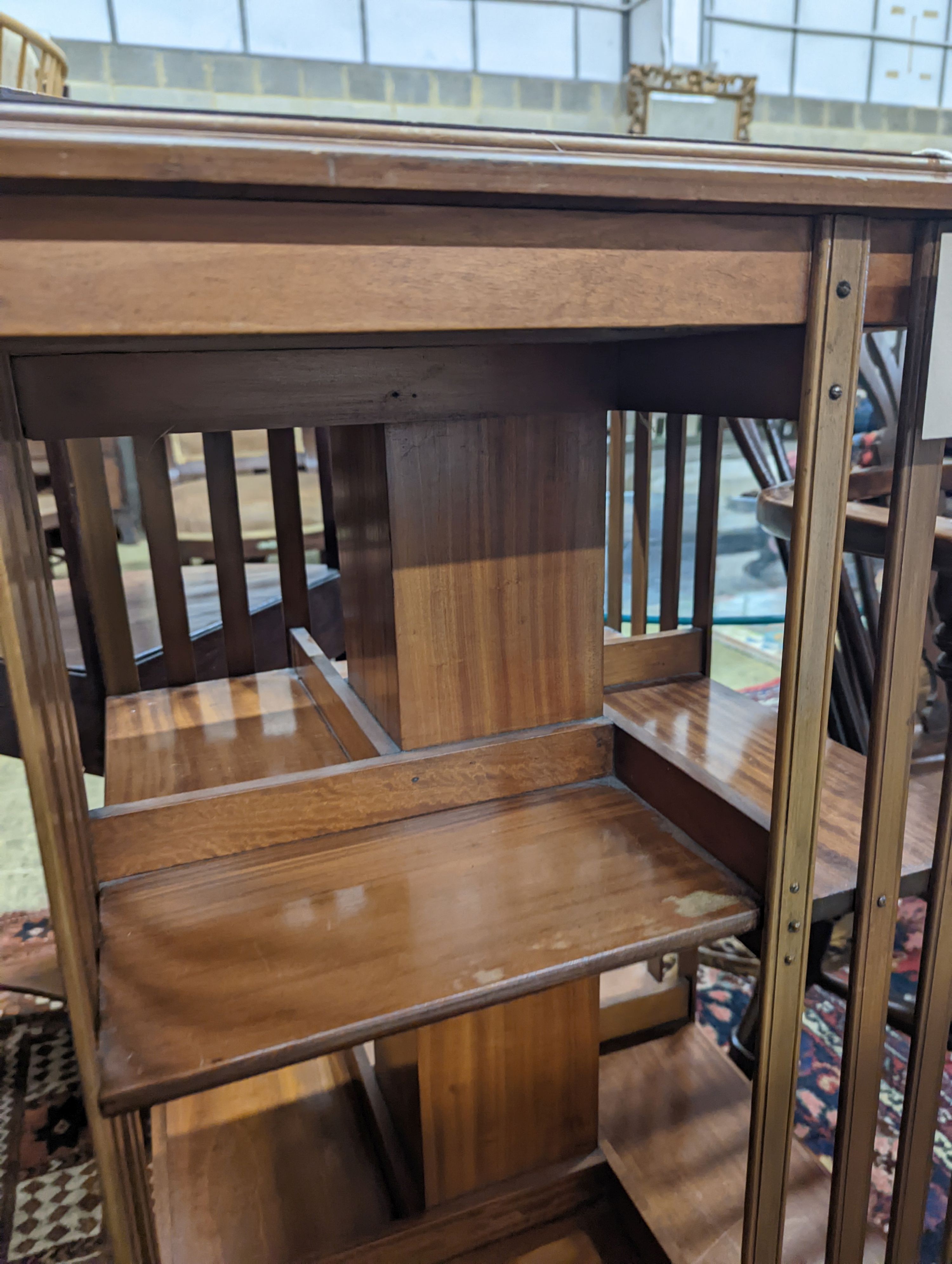 An Edwardian inlaid satinwood revolving bookcase, width 48cm, depth 47cm, height 85cm